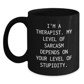 Gifts from Men to Therapists - Funny 'I'm A Therapist My Level Of Sarcasm Depends On Your Level Of Stupidity.' White Christmas Unique Gifts Black Coffee Mug - Main
