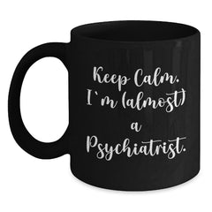 Funny Psychiatrist Gifts, Keep Calm I'm (almost) A Psychiatrist, Black Coffee Mug, Birthday Unique Presents for Men, Women, Friends, Coworkers, Family - Main