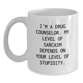 Funny Drug Counselor Gifts for Him, 'I'm A Drug Counselor. My Level Of Sarcasm Depends On Your Level Of Stupidity.' White Coffee Mug for Graduation, Gifts from Friends to Coworkers - Main
