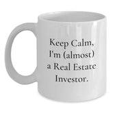 Funny Real Estate Investor Gifts for Him from Friends, White Coffee Mug with 'Keep Calm, I'm (almost) A Real Estate Investor.' Quote, Birthday Unique Gifts for Men, 11oz or 15oz Ceramic Mug - Main