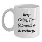 Funny Secretary Gifts from Friends - Keep Calm, I'm (almost) A Secretary. White Coffee Mug for Birthday - Main