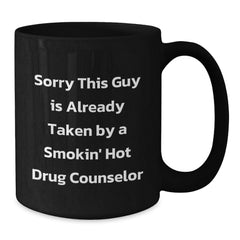 Funny Drug Counselor Gifts for Him, Unique Black Coffee Mug, 'Sorry This Guy Is Already Taken By A Smokin' Hot Drug Counselor' - Gifts from Men to Coworkers and Family - 11oz or 15oz Ceramic Mug - Additional