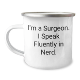 Funny Surgeon Gifts from Friends for Him - 'I'm A Surgeon. I Speak Fluently In genius.' Camping Mug, 12 oz Stainless Steel with Enamel Finish, Perfect for Father's Day - Image 1