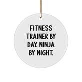 Fitness Trainer Gifts from Friends for Christmas - 'Fitness Trainer By Day. Ninja By Night.' Circle Ornament - Image 1