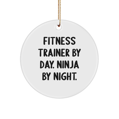 Fitness Trainer Gifts from Friends for Christmas - 'Fitness Trainer By Day. Ninja By Night.' Circle Ornament - Image 1
