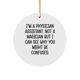 Funny Physician Assistant Gifts from Friends or Family - 'I'm A Physician Assistant. Not A Magician' Circle Ornament for Christmas - Image 1