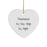 Pharmacist Gifts from Friends, Funny 'Pharmacist By Day. Ninja By Night.' Heart Ornament for Christmas - Image 1