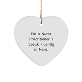 Funny Nurse Practitioner Gifts from Friends - I'm A Nurse Practitioner. I Speak Fluently In genius. - Heart Ornament for Christmas - Image 1