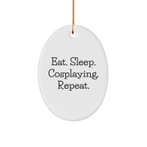 Funny Cosplaying Gifts for Friends - Eat. Sleep. Cosplaying. Repeat. Oval Ornament, Gifts from Friends for Cosplaying Enthusiasts - Image 1