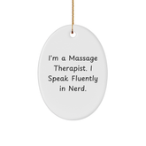 Funny Massage Therapist Gifts for Christmas - 'I'm A Massage Therapist. I Speak Fluently In genius.' Oval Ornament, Gifts from Friends for Massage Therapist - Image 1
