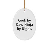 Cook Gifts from Friends - Oval Ornament with Funny Quote 'Cook By Day. Ninja By Night.' for Christmas Unique Gifts for Cook - Image 1
