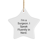 Surgeon Star Ornament Gifts from Friends - Funny 'I'm A Surgeon. I Speak Fluently In genius.' Quote, White Color, Star Shaped, Perfect for Christmas, Gifts for Surgeon - Image 1
