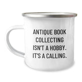 Antique Book Collecting Gifts from Friends to Family: Inspirational Camping Mug for Graduation, Perfect for Book Lovers, 'Antique Book Collecting Isn't A Hobby. It's A Calling.' Quote - Image 1