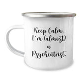 Gifts from Friends for Psychiatrist - Keep Calm, I'm (almost) A Psychiatrist. - 12 oz Stainless Steel Camping Mug for Birthday - Image 1