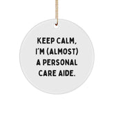 Funny Personal Care Aide Gifts from Friends, Christmas Circle Ornament 'Keep Calm, I'm (almost) A Personal Care Aide.' for Men, Women, Family - Image 1