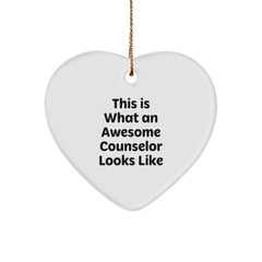 Funny Counselor Gifts from Friends for Christmas - 'This Is What An Awesome Counselor Looks Like' Heart Ornament - Image 1