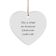 Funny Electrician Gifts, Heart-Shaped Ornament, 'This Is What An Awesome Electrician Looks Like' Quote, Gifts from Men for Electrician, Christmas Unique Gifts for Home - Image 1