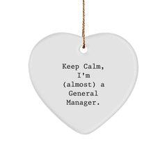Funny Gifts for General Manager, Heart Ornament - 'Keep Calm, I'm (almost) A General Manager.' - Gifts from Family, Friends, Coworkers - Perfect Christmas Unique Gift for General Manager - Image 1