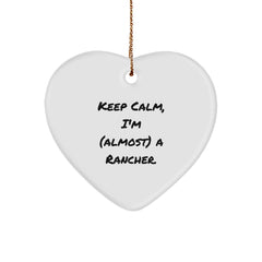 Funny Rancher Gifts from Friends - Keep Calm, I'm (almost) A Rancher. Heart Ornament for Christmas - Image 1
