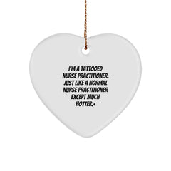 Funny Nurse Practitioner Heart Ornament, Gifts from Men to Women, Nurse Practitioner Gifts for Christmas, I'm A Tattooed Nurse Practitioner. Just Like A Normal Nurse Practitioner Except Much Hotter.+ - Image 1
