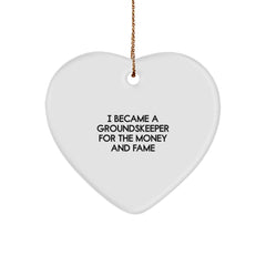 groundskeeper Gifts from Friends, Funny Heart Ornament for Christmas, 'I Became A groundskeeper For The Money And Fame' Quote - Image 1