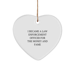 Funny Law Enforcement Officer Gifts for Him - Heart Ornament with Quote 'I Became A Law Enforcement Officer For The Money And Fame' - Christmas Unique Gift for Men from Friends or Family - Image 1