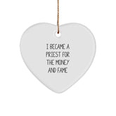 Funny Priest Gifts, Heart Ornament, 'I Became A Priest For The Money And Fame' Quote, Christmas Unique Gifts from Family for Priest - Image 1