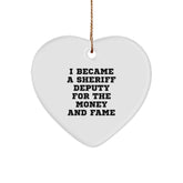 Funny Sheriff Deputy Gifts for Men from Friends - 'I Became A Sheriff Deputy For The Money And Fame' Heart Ornament for Christmas - Image 1