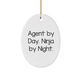 Agent Gifts from Men - Funny Agent Oval Ornament for Christmas - 'Agent By Day. Ninja By Night.' - Image 1