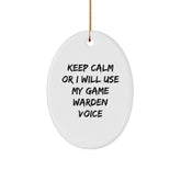 Funny Game Warden Gifts from Men, Game Warden Christmas Unique Gifts for Him, Oval Ornament Keep Calm 'I Will Use My Game Warden Voice' - Image 1
