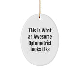Funny Optometrist Gifts from Friends - This Is What An Awesome Optometrist Looks Like, Oval Ornament for Christmas, Gifts for Optometrist - Image 1