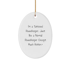 Funny Housekeeper Gifts for Housekeepers - I'm A Tattooed Housekeeper. Just Like A Normal Housekeeper Except Much Hotter.+, Christmas Oval Ornament for Friends or Family - Image 1