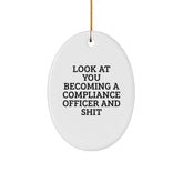 Funny Compliance Officer Gifts for Him, Oval Ornament with 'Look At You Becoming A Compliance Officer And Shit' Humor, Gifts from Men, Perfect Office Christmas Unique Decorations - Image 1