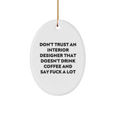 Funny Interior Designer Christmas Oval Ornament Gifts from Friends, Coworkers, Family, Men, Women - 'Don't Trust An Interior Designer That Doesn't Drink Coffee And Say F--k A Lot' - Image 1