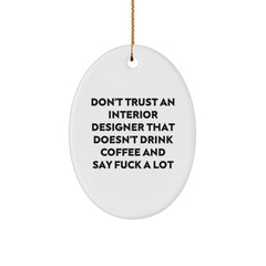 Funny Interior Designer Christmas Oval Ornament Gifts from Friends, Coworkers, Family, Men, Women - 'Don't Trust An Interior Designer That Doesn't Drink Coffee And Say F--k A Lot' - Image 1