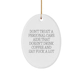 Funny Personal Care Aide Gifts from Men to Women, Don't Trust A Personal Care Aide That Doesn't Drink Coffee And Say F--k A Lot, Oval Ornament for Christmas - Image 1