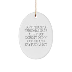 Funny Personal Care Aide Gifts from Men to Women, Don't Trust A Personal Care Aide That Doesn't Drink Coffee And Say F--k A Lot, Oval Ornament for Christmas - Image 1