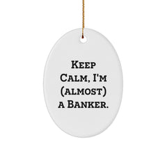 Funny Banker Gifts - 'Keep Calm, I'm (almost) A Banker.' Oval Ornament for Christmas, Gifts from Family to Banker - Image 1