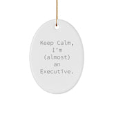 Funny Executive Oval Ornament, Gifts from Friends to Men, Keep Calm, I'm (almost) An Executive., White Oval Shaped, Christmas Unique Gifts for Him - Image 1