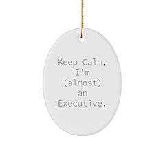 Funny Executive Oval Ornament, Gifts from Friends to Men, Keep Calm, I'm (almost) An Executive., White Oval Shaped, Christmas Unique Gifts for Him - Image 1