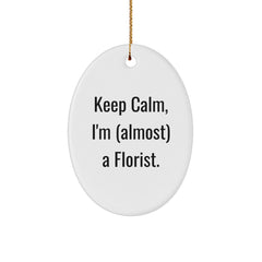 Funny Florist Gifts for Women, Oval Ornament with 'Keep Calm, I'm (almost) A Florist.' Quote, Perfect for Christmas Memorable Presents from Friends to Family - Image 1