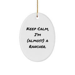 Funny Rancher Oval Ornament Gifts from Friends for Christmas, 'Keep Calm, I'm (almost) A Rancher.' - Image 1