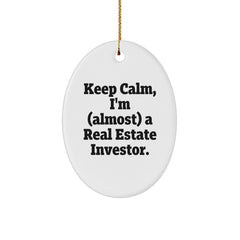 Funny Real Estate Investor Gifts - Keep Calm I'm (almost) A Real Estate Investor Oval Ornament, Gifts from Friends to Family for Christmas - Image 1