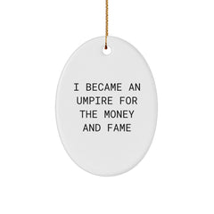 Umpire Gifts for Men, Funny Oval Ornament for Christmas, 'I Became An Umpire For The Money And Fame' Quote, Gifts from Family - Image 1