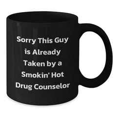 Funny Drug Counselor Gifts for Him, Unique Black Coffee Mug, 'Sorry This Guy Is Already Taken By A Smokin' Hot Drug Counselor' - Gifts from Men to Coworkers and Family - 11oz or 15oz Ceramic Mug - Additional