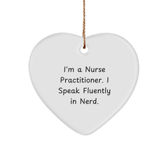 Funny Nurse Practitioner Gifts from Friends - I'm A Nurse Practitioner. I Speak Fluently In genius. - Heart Ornament for Christmas - Image 1