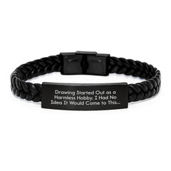 Funny Drawing Hobby Gifts from Friends to Men or Women on Birthday - Interlaced Leather Bracelet with Quote 'Drawing Started Out As A Harmless Hobby' - Image 1