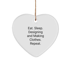 Designing and Making Clothes Enthusiasts Gifts from Family, Heart Ornament for Christmas, Eat. Sleep. Designing And Making Clothes. Repeat., Funny Quote, White Heart Shaped Decoration - Image 1