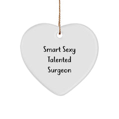 Smart Sexy Talented Surgeon Gifts for Christmas, Heart Ornament with Funny Quote, 'Gifts from Men for Surgeons' - Image 1