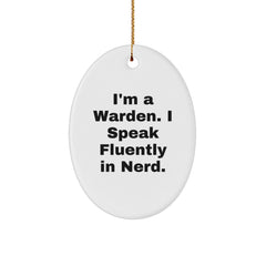 Warden Oval Ornament Gifts from Friends for Christmas - 'I'm A Warden. I Speak Fluently In genius.' Funny Quote Oval Shaped Ornament, White, 3.25'' Tall, MDF and High-Gloss Plastic Finish - Image 1